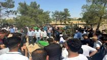 Serinlemek için girdiği Fırat  Nehri'nde boğulan iki kız kardeş  yan yana toprağa verildi.